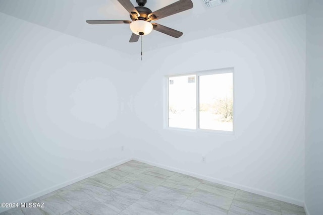 empty room featuring ceiling fan