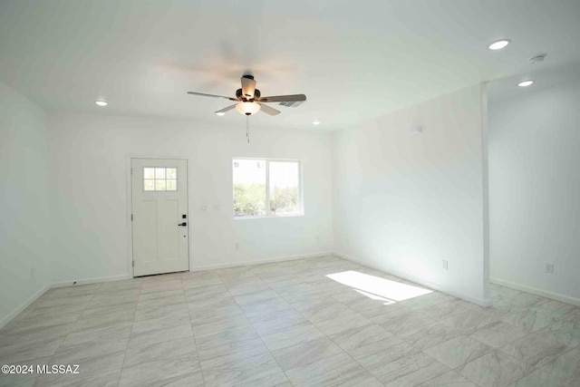 unfurnished room featuring ceiling fan