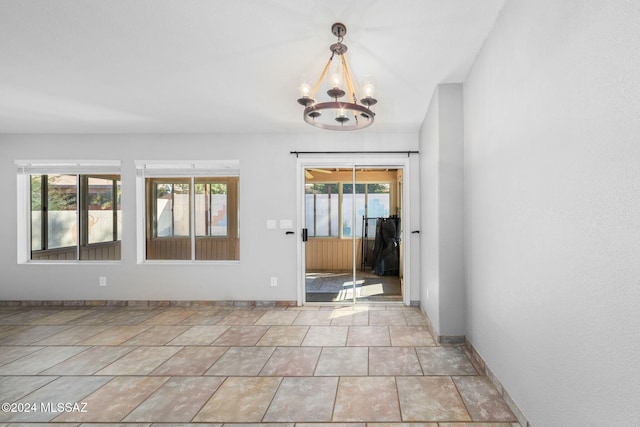 interior space featuring a chandelier