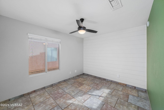 spare room featuring ceiling fan