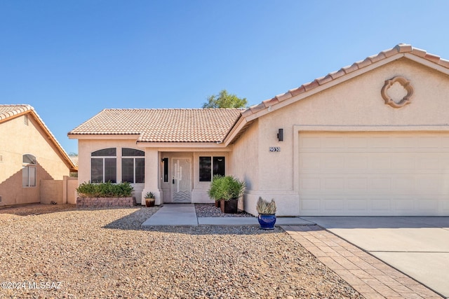 view of front of home with a garage