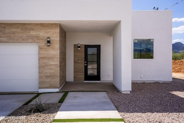 entrance to property with a garage