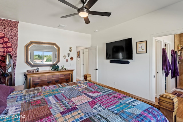 bedroom featuring hardwood / wood-style floors and ceiling fan