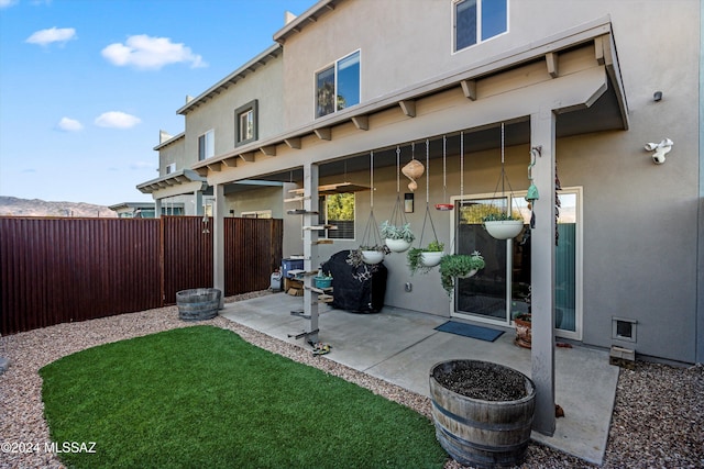 rear view of property with a patio area