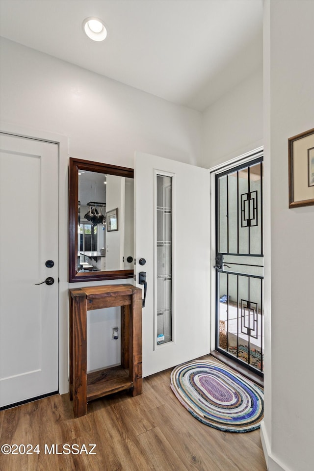 entrance foyer with hardwood / wood-style floors