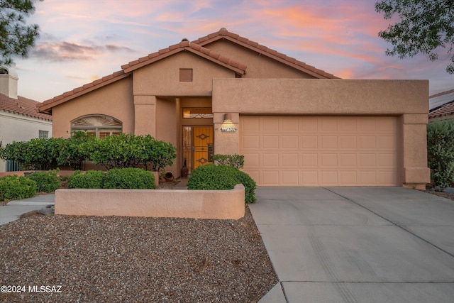 view of front of home featuring a garage