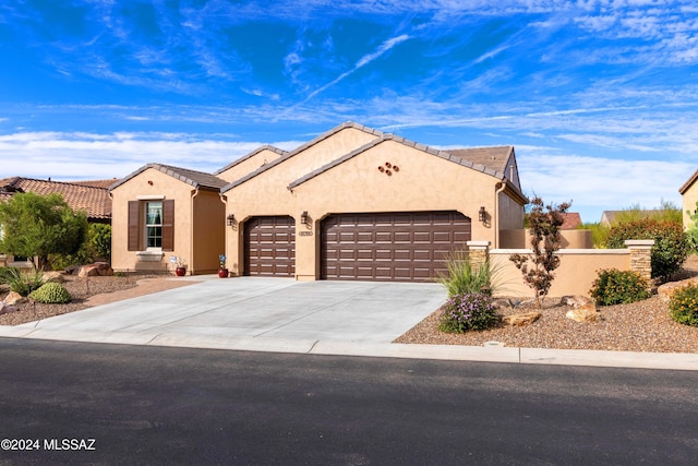 view of front of home with a garage