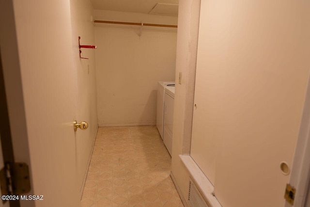 laundry room featuring washer and dryer