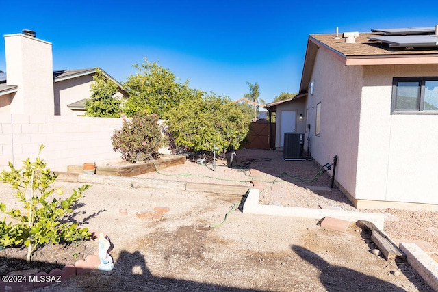 view of yard featuring central AC