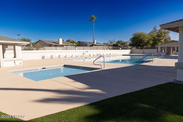 view of pool featuring a patio area