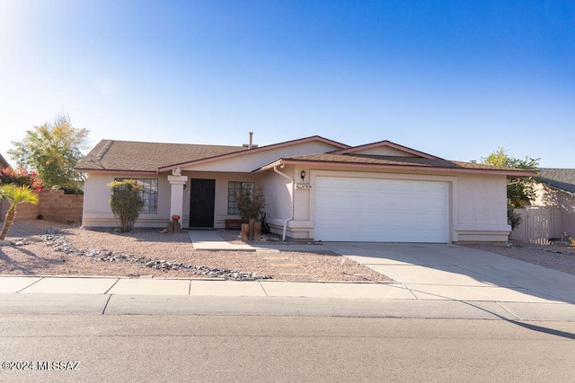 ranch-style house with a garage