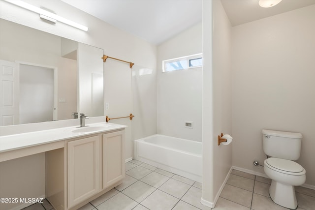 bathroom featuring toilet, vanity, a bathing tub, and tile patterned flooring