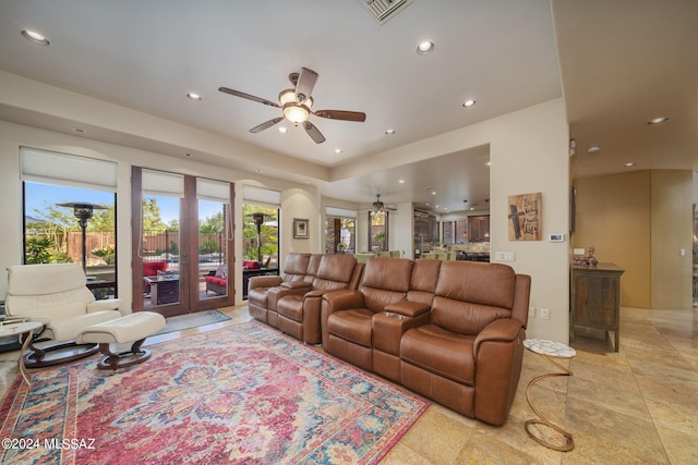 living room with french doors and ceiling fan