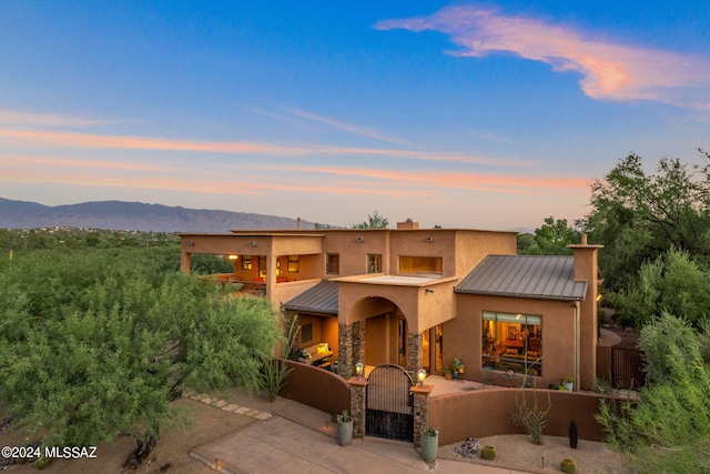 view of front of home with a mountain view