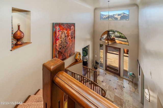 foyer entrance with a high ceiling