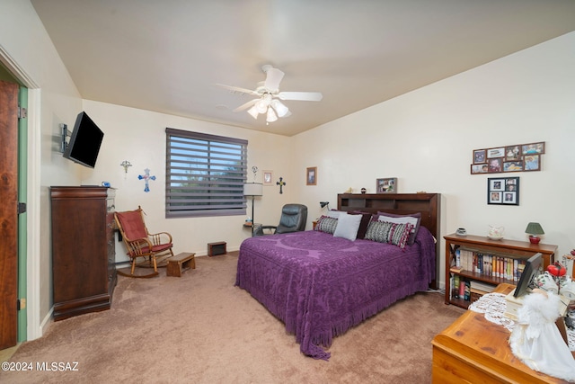 bedroom featuring ceiling fan and carpet floors