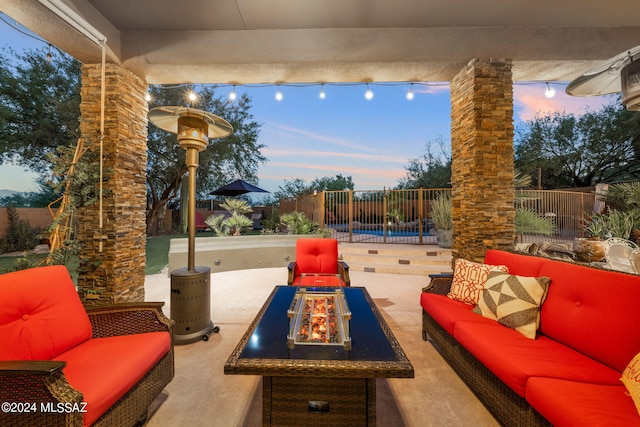 patio terrace at dusk with an outdoor hangout area