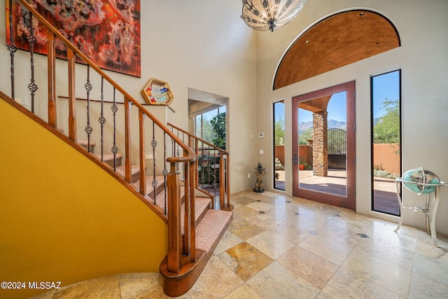 entryway featuring a high ceiling