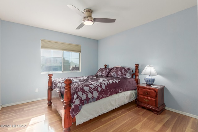 bedroom featuring ceiling fan and light wood-type flooring