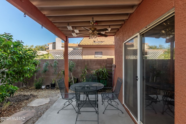 view of patio featuring ceiling fan