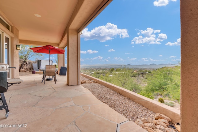 view of patio featuring a mountain view