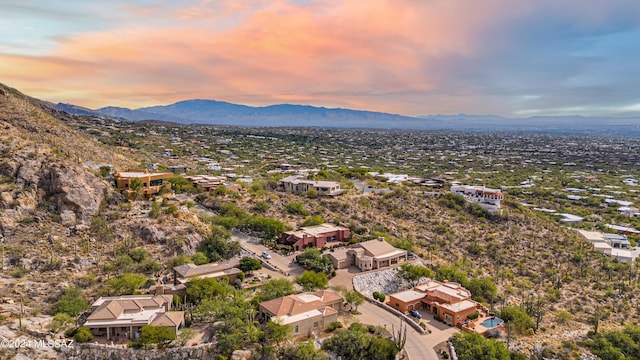 aerial view at dusk with a mountain view