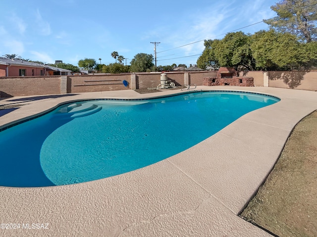 view of pool featuring a patio