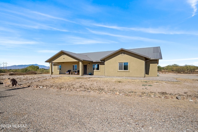 view of front facade featuring a mountain view