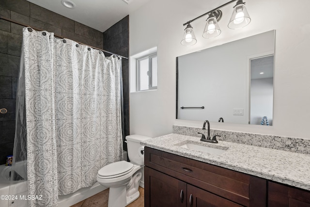 full bathroom featuring shower / tub combo, vanity, and toilet