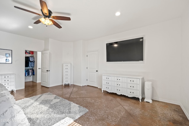 bedroom with ceiling fan and a closet