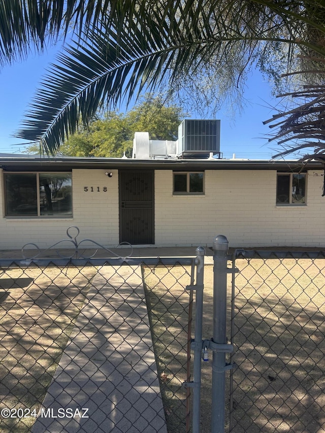 view of front of property featuring central air condition unit