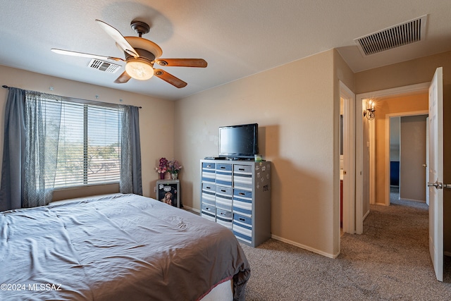 bedroom featuring ceiling fan and light colored carpet