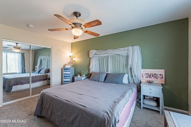 bedroom featuring carpet floors, a closet, and ceiling fan