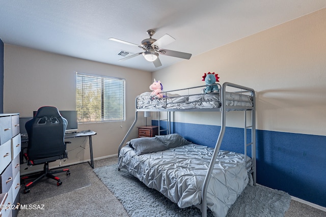 bedroom featuring ceiling fan and carpet floors