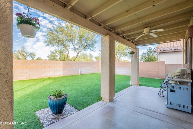 view of patio featuring ceiling fan