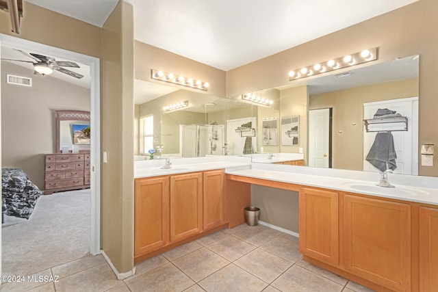 bathroom featuring tile patterned flooring, ceiling fan, and vanity