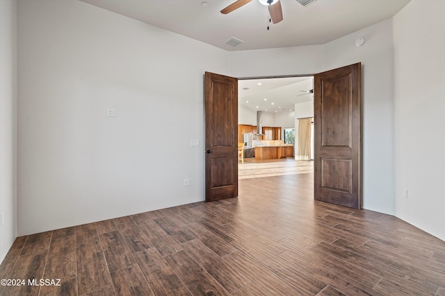 unfurnished room with visible vents, recessed lighting, a ceiling fan, and wood finished floors