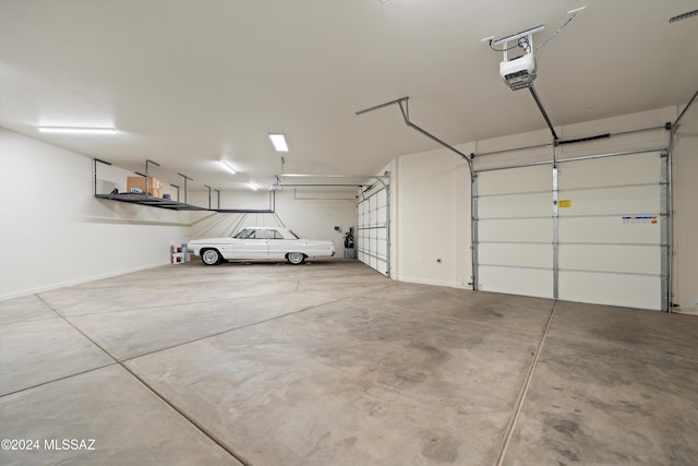 garage featuring a garage door opener