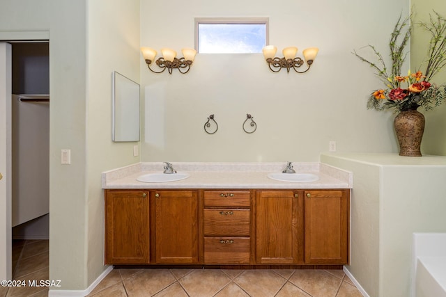 bathroom with tile patterned flooring and vanity