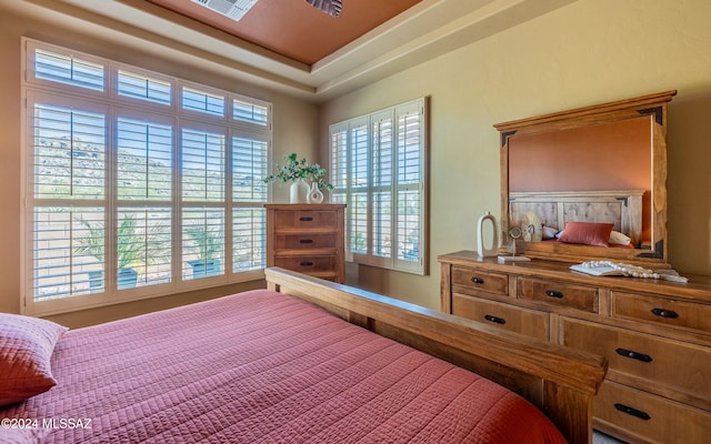 bedroom featuring multiple windows