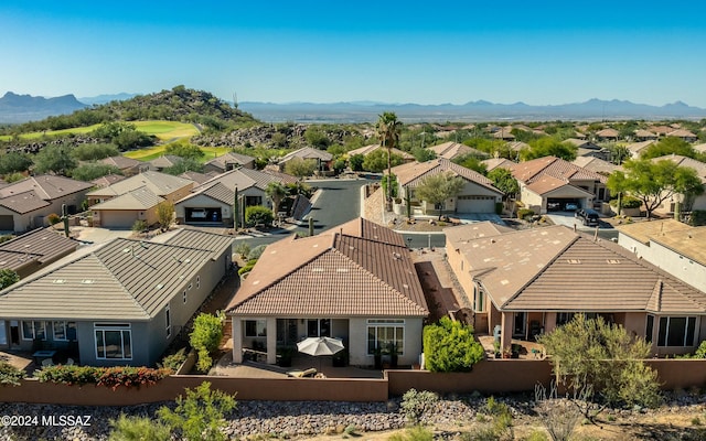 drone / aerial view featuring a mountain view