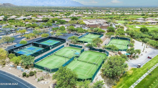 birds eye view of property featuring a mountain view