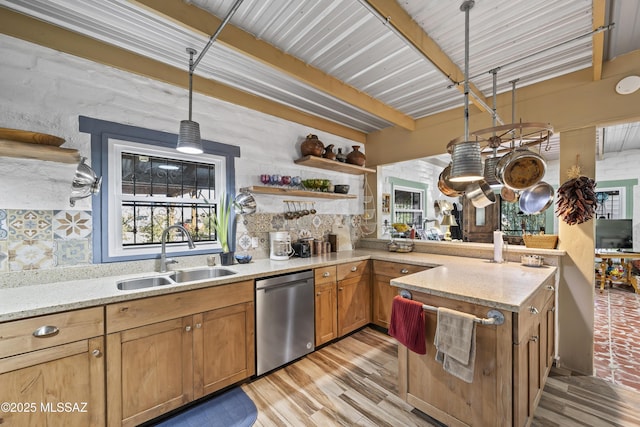 kitchen with dishwasher, sink, light stone countertops, beamed ceiling, and decorative light fixtures