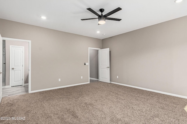 unfurnished bedroom with carpet floors and ceiling fan