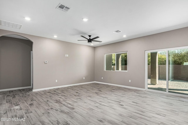 unfurnished room with light hardwood / wood-style floors and ceiling fan