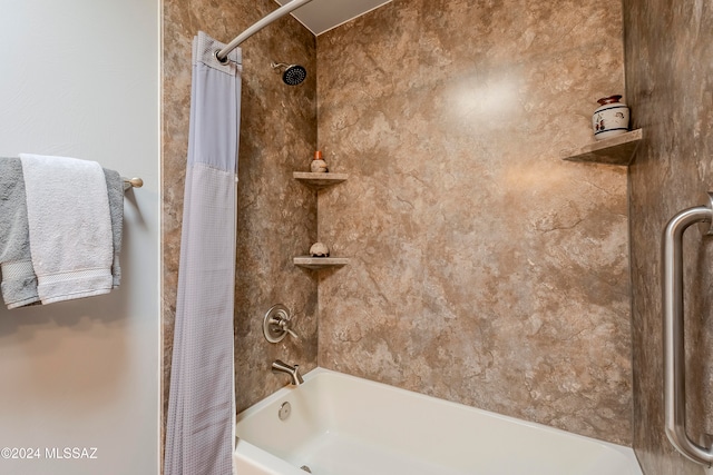 bathroom featuring shower / bath combination with curtain