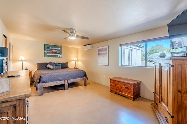 bedroom with concrete floors, a wall mounted AC, and ceiling fan