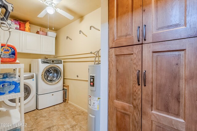 laundry area with cabinets, electric water heater, washing machine and dryer, and ceiling fan