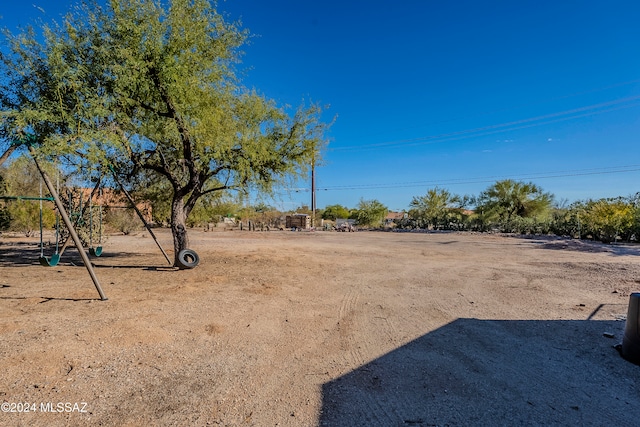 view of yard with a playground