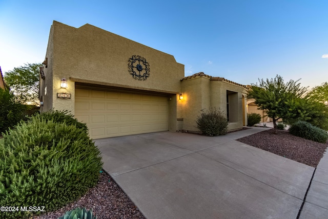 view of front of property featuring a garage